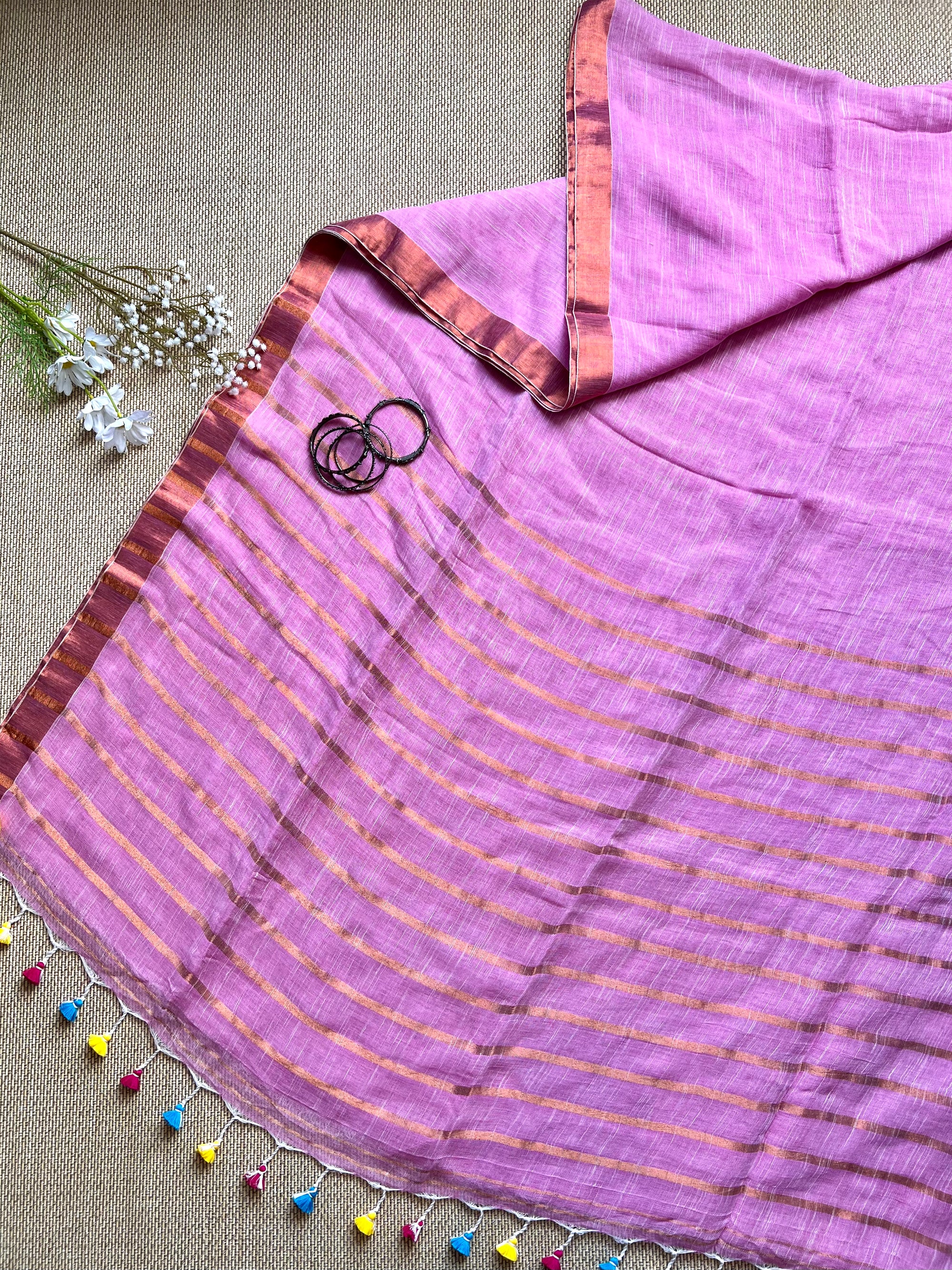 Baby pink :  Linen By Linen Saree with copper zari border