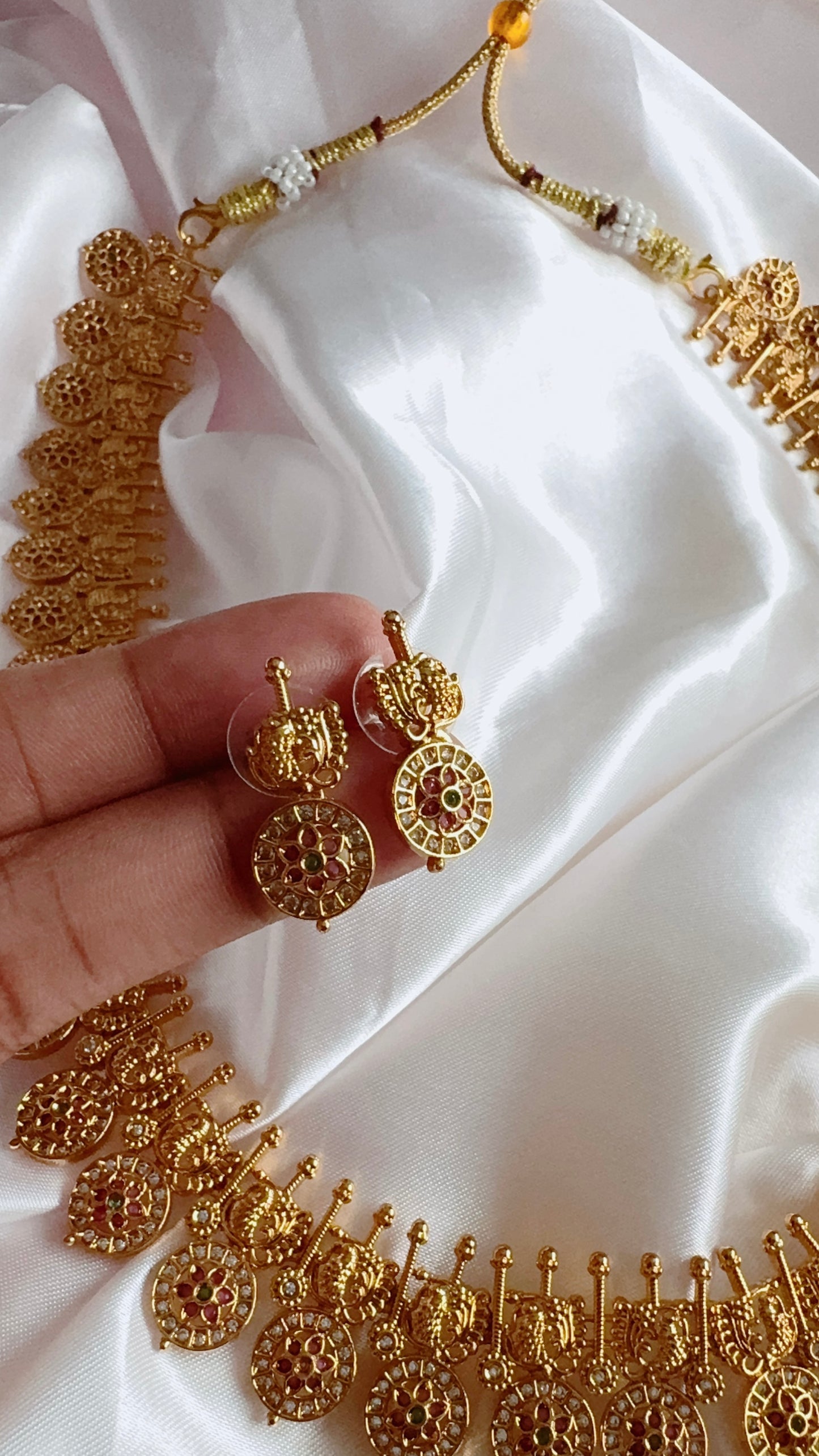 Traditional neckwear and earrings