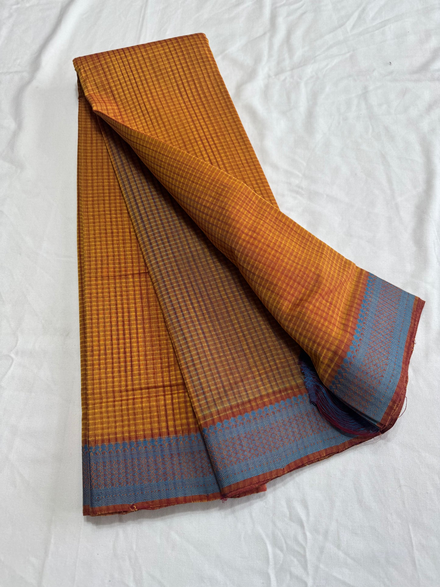 MAnglagiry missing Checks with nizam thread border