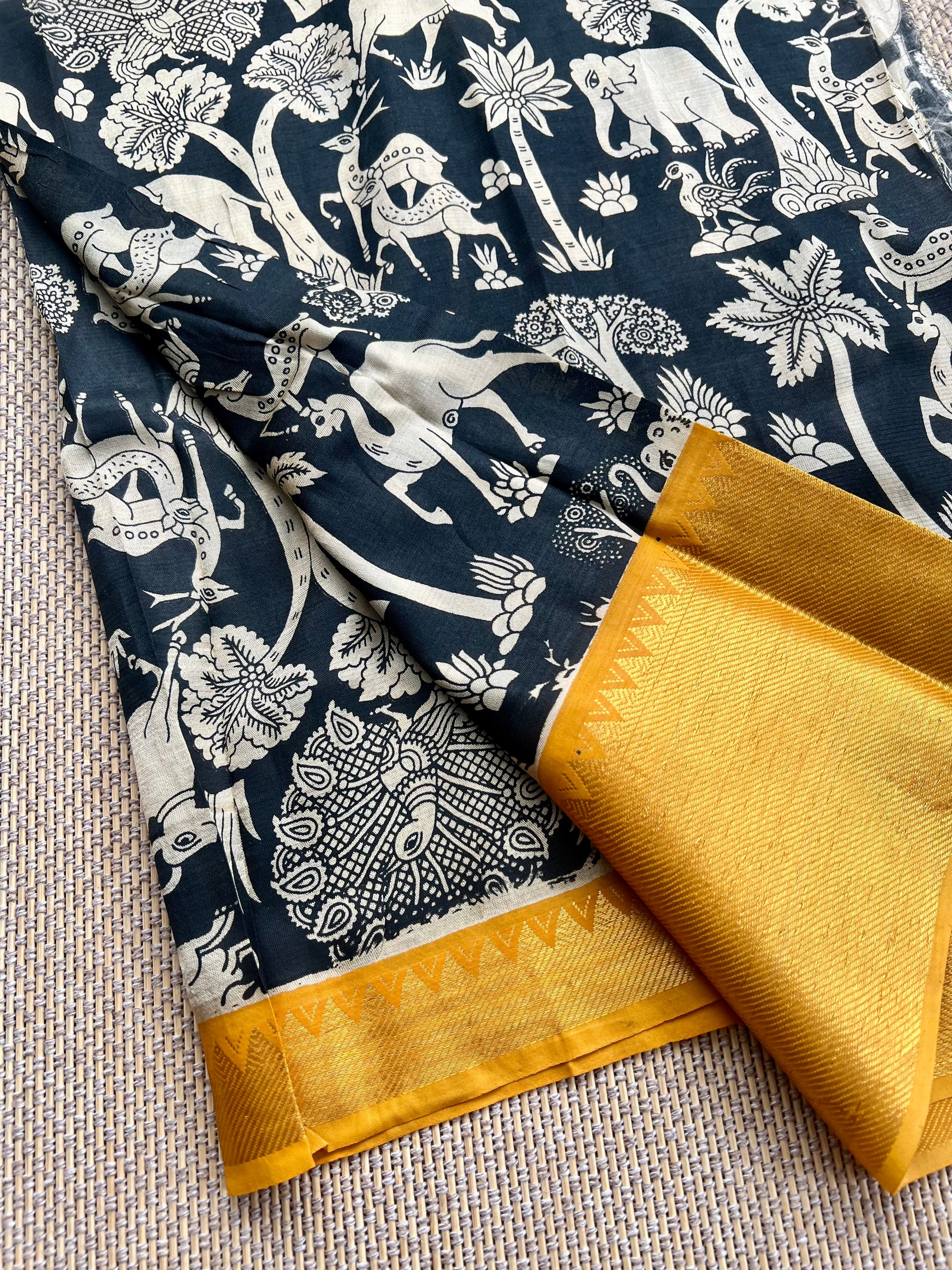 Screen printed kalamkari design on chinoor silk with famous MAnglagiry gold border