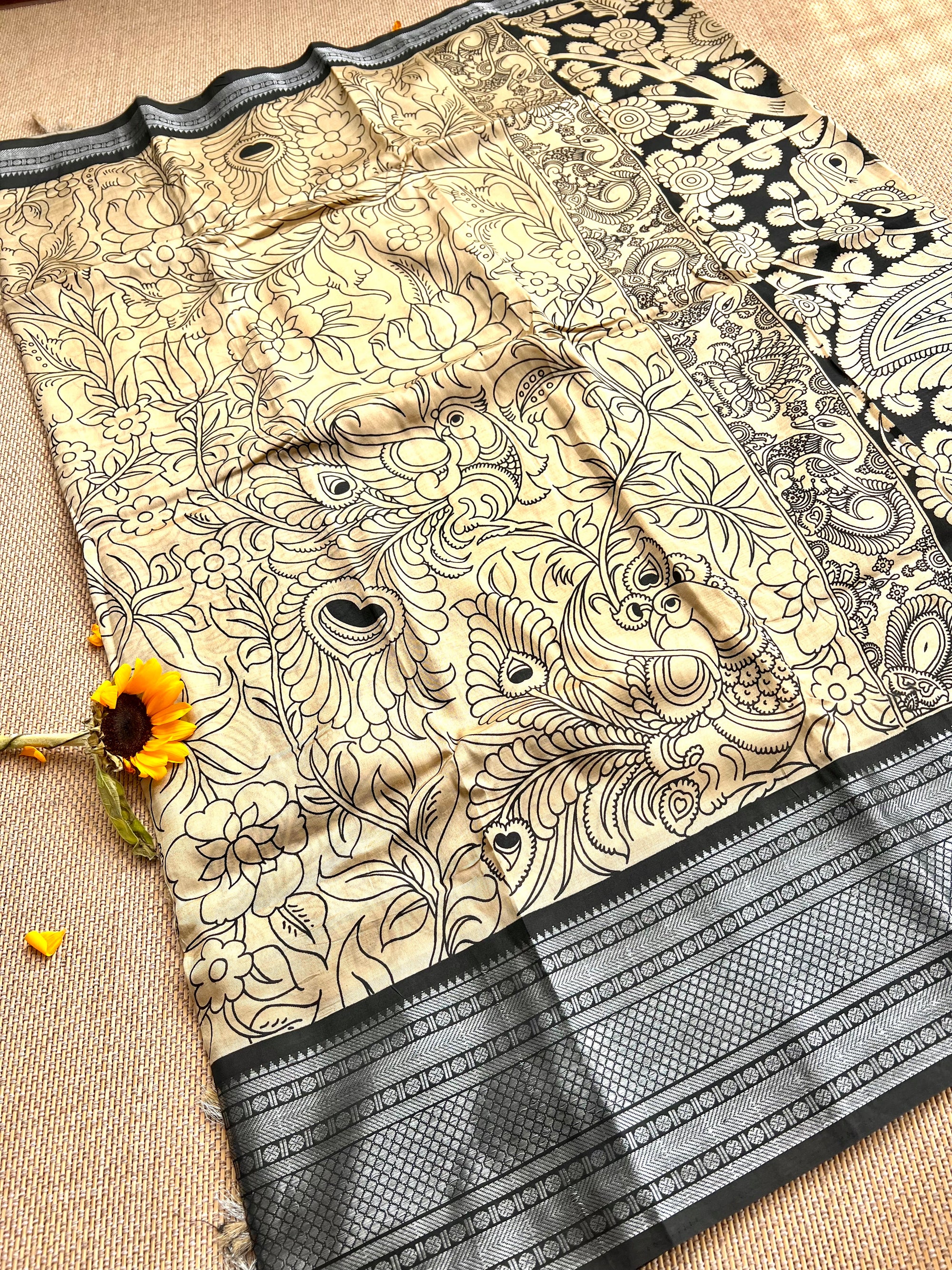 Screen printed kalamkari design on chinoor silk with famous MAnglagiry gold border