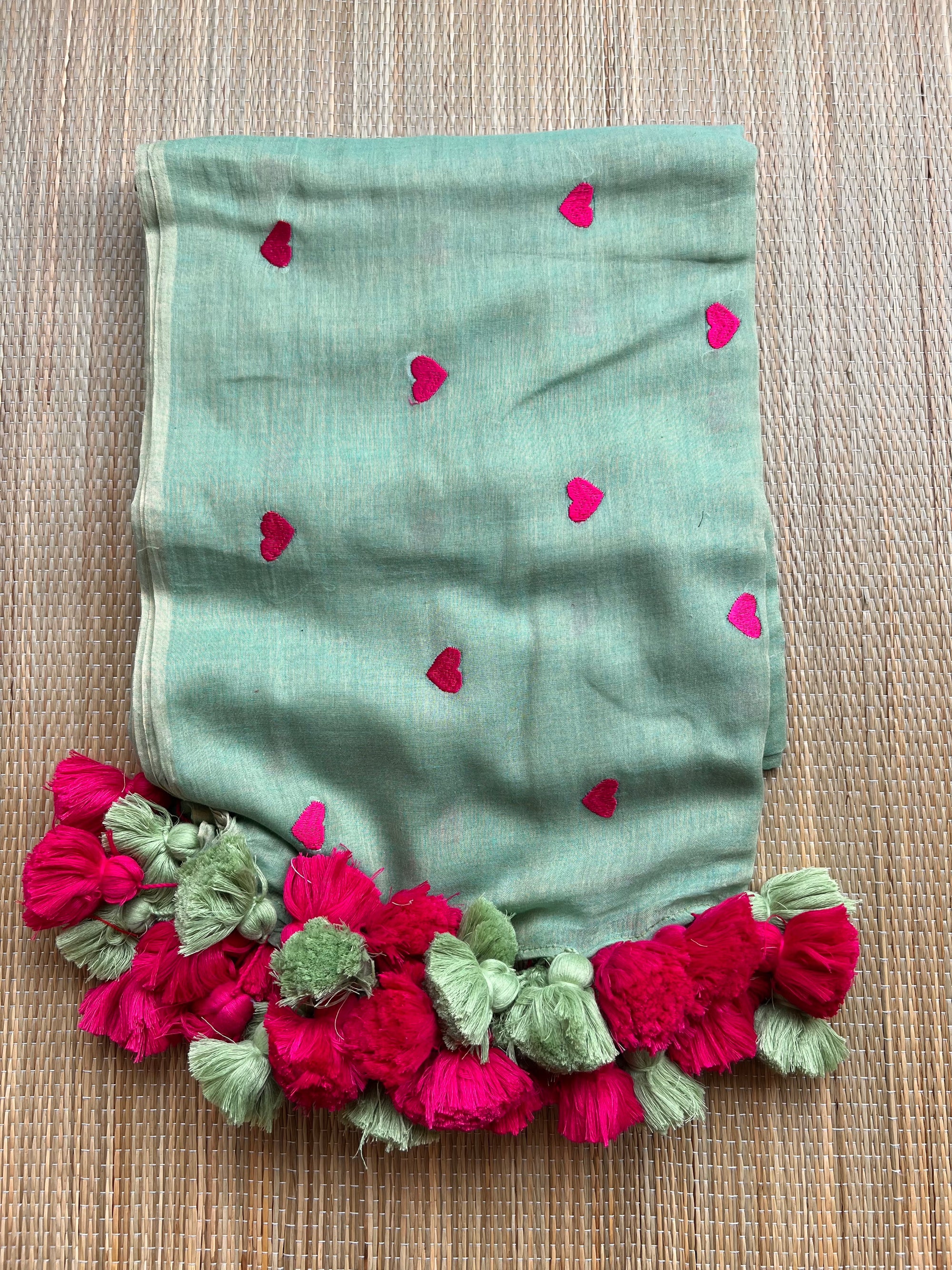 Love love embroidery with big pom pom saree