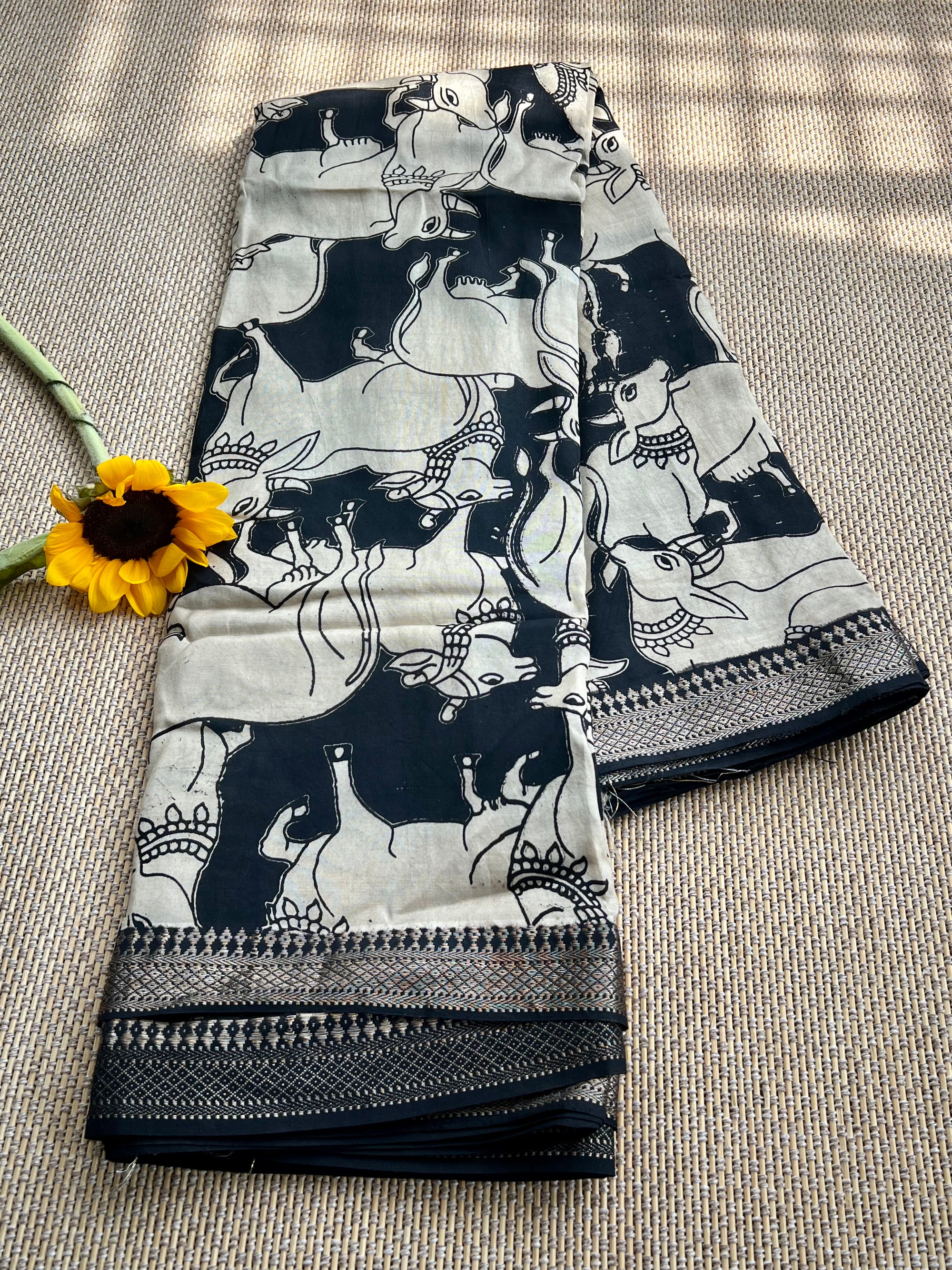 Screen printed kalamkari design on chinoor silk with famous MAnglagiry nizam border