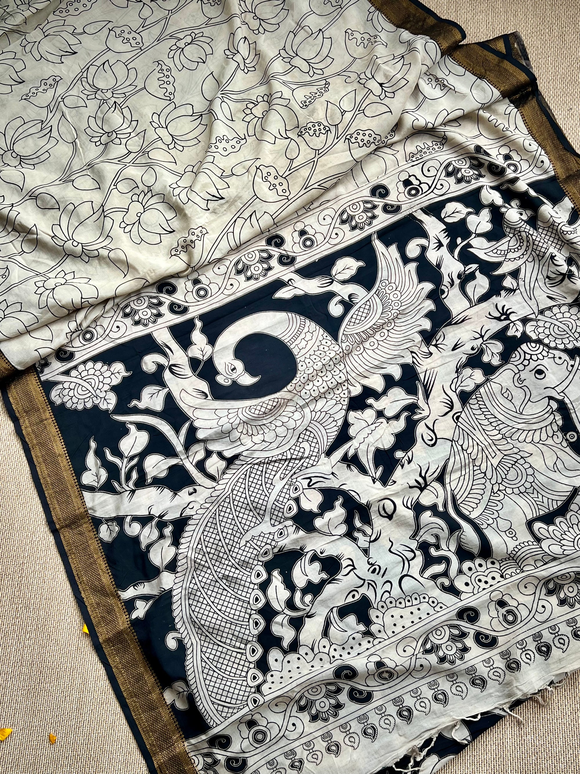 Screen printed kalamkari design on chinoor silk with famous MAnglagiry nizam border