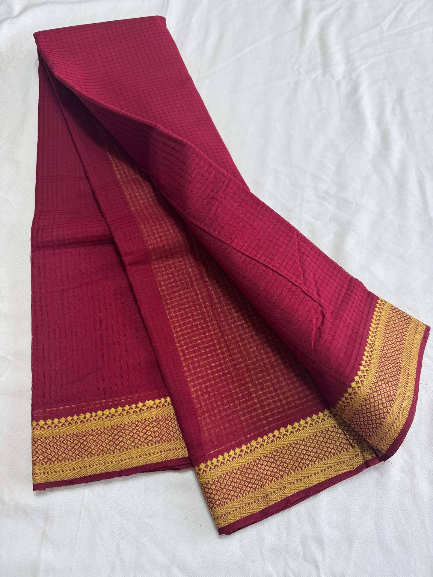 MAnglagiry missing Checks with nizam thread border