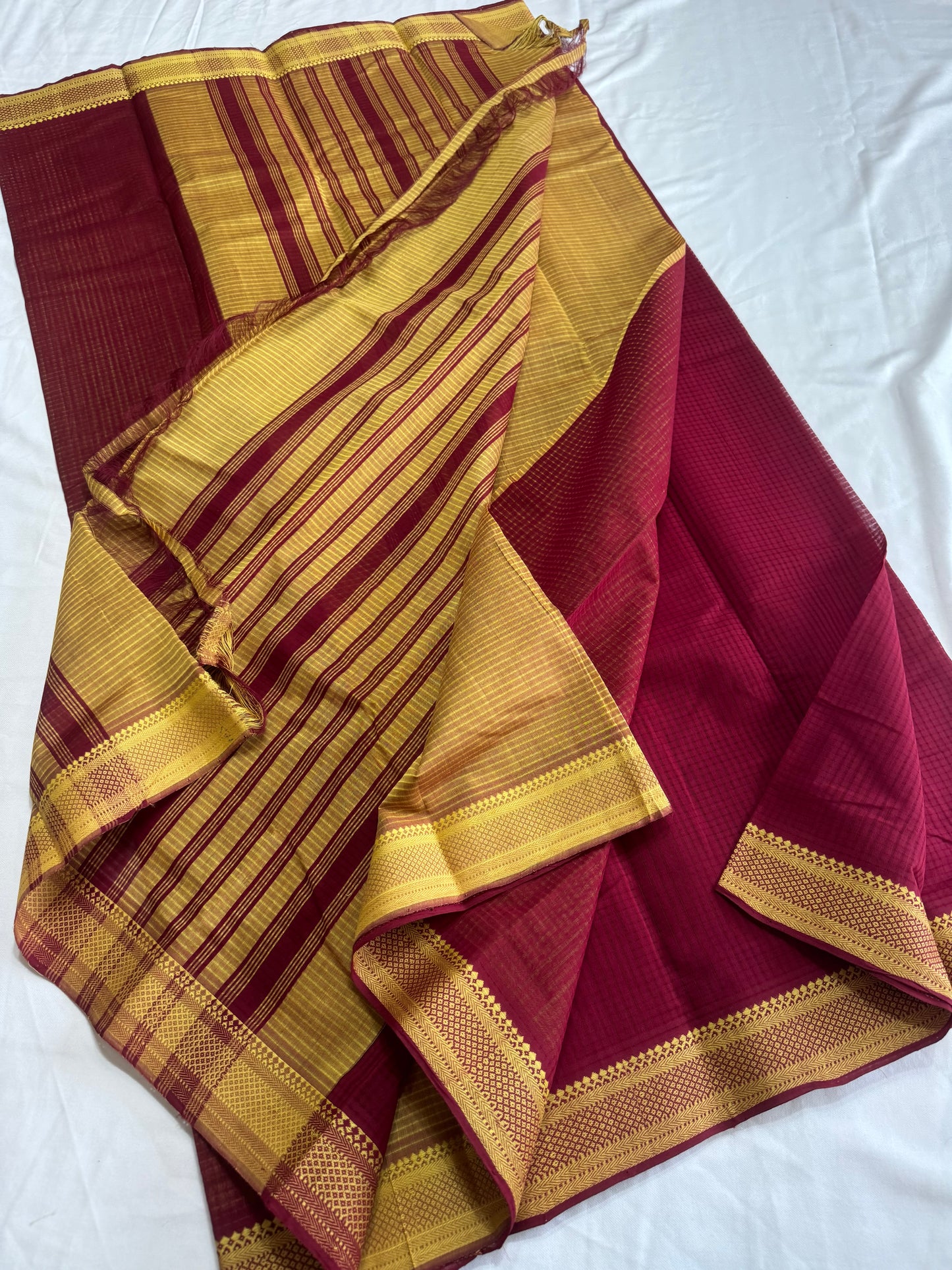 MAnglagiry missing Checks with nizam thread border