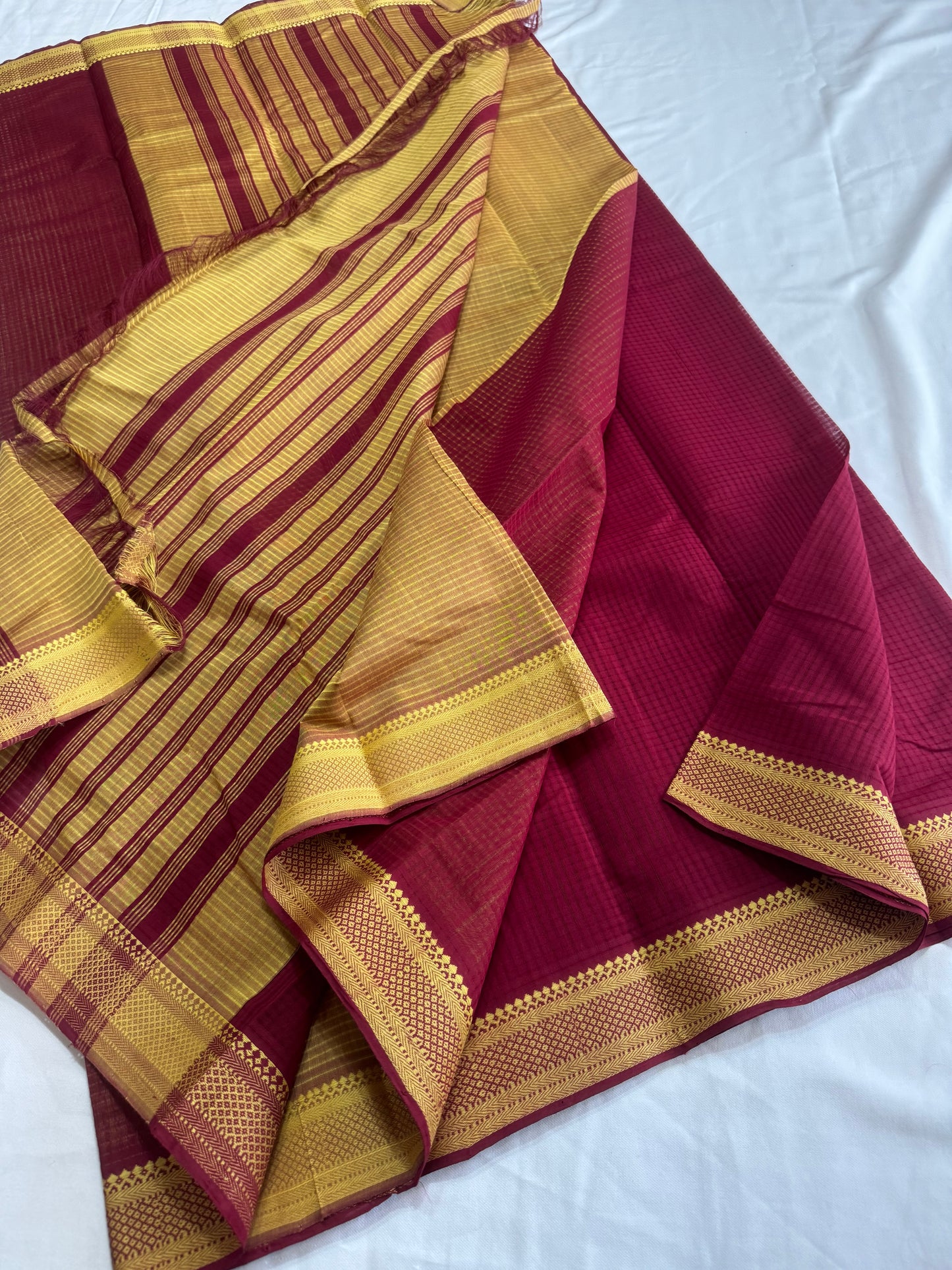 MAnglagiry missing Checks with nizam thread border